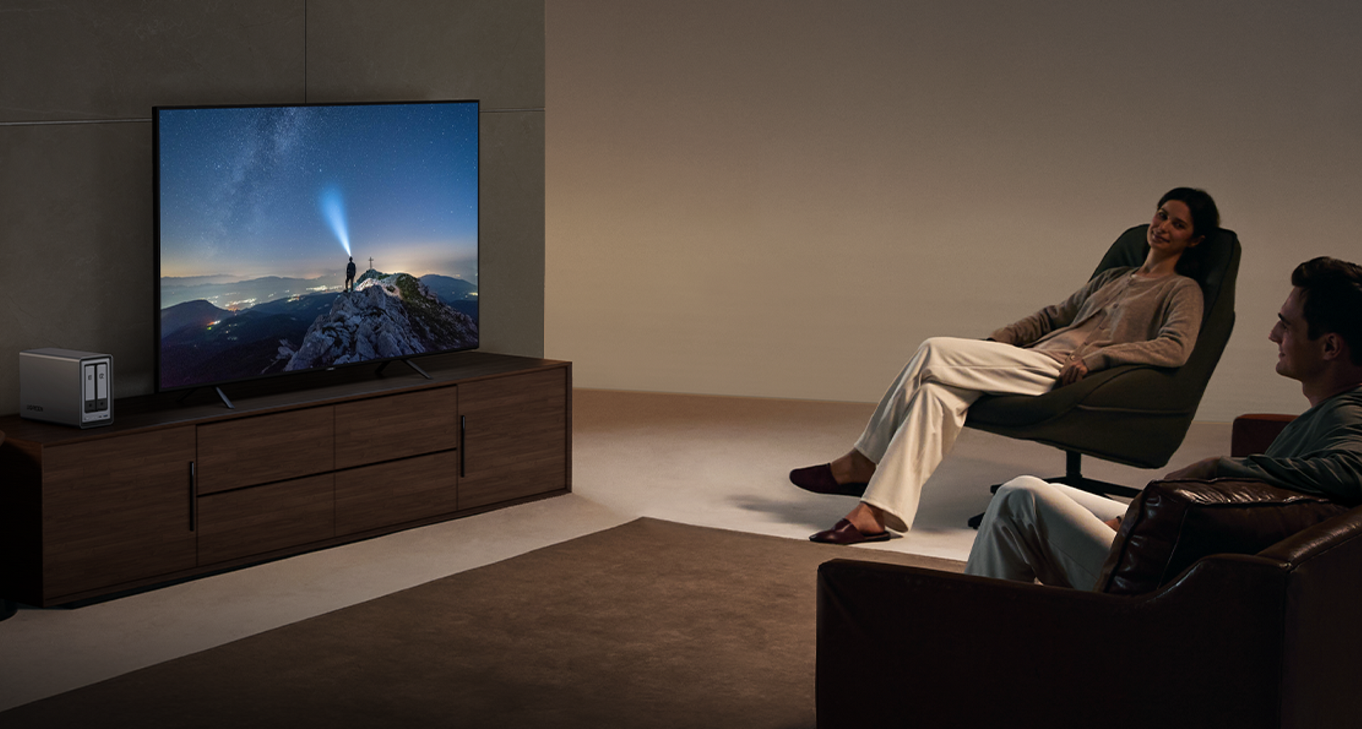 UGREEN NASync DXP2800 home media server streaming movies to TV in living room environment.