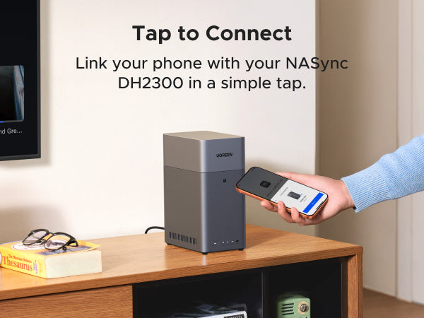 UGREEN NASync DH2300 tap-to-connect setup with a smartphone.